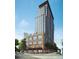 The exterior rendering of a modern high-rise features a combination of brick and glass at 400 W Main St # 2502, Durham, NC 27701