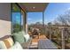 Balcony area featuring a comfortable seating area and a view of the beautiful neighborhood at 600 N Roxboro St # 41, Durham, NC 27701