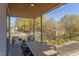 Expansive balcony with an outdoor dining area and seating that has a beautiful view of the area at 600 N Roxboro St # 41, Durham, NC 27701