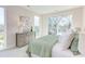 Bedroom featuring lots of natural light, light paint, and balcony access at 600 N Roxboro St # 41, Durham, NC 27701