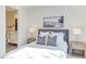 Bedroom features a queen bed, matching night stands, and a lamp for soft lighting at 600 N Roxboro St # 41, Durham, NC 27701