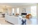 Bright and airy living room with modern fireplace and dining area featuring hardwood floors at 600 N Roxboro St # 41, Durham, NC 27701