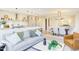 Open concept living room and kitchen area with hardwood floors and light neutral colors at 600 N Roxboro St # 41, Durham, NC 27701