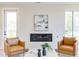 Cozy living room featuring a modern fireplace and comfortable seating area with a view at 600 N Roxboro St # 41, Durham, NC 27701