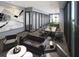 Modern conference room with stylish furniture, artwork, and ample natural light at 400 W Main St # 2010, Durham, NC 27701