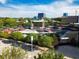 Aerial view of Red Hat Amphitheater in an urban setting at 610 Walnut Hts Dr # 102, Raleigh, NC 27610