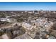 Aerial view of a residential neighborhood with modern townhomes and mature trees at 610 Walnut Hts Dr # 102, Raleigh, NC 27610