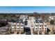 A close aerial view of symmetrical, modern townhomes in a new development at 610 Walnut Hts Dr # 102, Raleigh, NC 27610