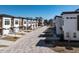 Wide street view of new construction townhomes showcases the community layout and design at 610 Walnut Hts Dr # 102, Raleigh, NC 27610