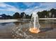 Engaging splash pad with playful water fountain features on a sunny day at 610 Walnut Hts Dr # 102, Raleigh, NC 27610