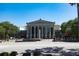 View of the Raleigh Memorial Auditorium with manicured landscaping and a clear blue sky at 1317 Garner Rd # 101, Raleigh, NC 27610