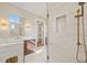 Modern bathroom with a glass shower and dual sinks at 291 Riverstone Dr, Pittsboro, NC 27312