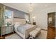 Spacious primary bedroom with backyard access at 291 Riverstone Dr, Pittsboro, NC 27312