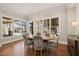 Breakfast area with an oval table and plenty of natural light at 291 Riverstone Dr, Pittsboro, NC 27312