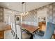 Formal dining room with a view into the kitchen at 291 Riverstone Dr, Pittsboro, NC 27312