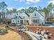 Custom home exterior showcasing stone and siding at 291 Riverstone Dr, Pittsboro, NC 27312