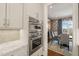 Stainless steel appliances and granite countertops in kitchen at 291 Riverstone Dr, Pittsboro, NC 27312