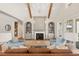 Open living room with fireplace and built-in shelves at 291 Riverstone Dr, Pittsboro, NC 27312