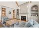 Fireplace with built-in shelving in the living room at 291 Riverstone Dr, Pittsboro, NC 27312