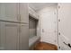 Functional mudroom with gray cabinets, built-in bench, and storage at 291 Riverstone Dr, Pittsboro, NC 27312