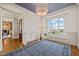 Home office with hardwood floors, window seat, and blue ceiling at 291 Riverstone Dr, Pittsboro, NC 27312