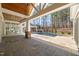 Luxury pool with covered patio, outdoor kitchen, and fire features at 291 Riverstone Dr, Pittsboro, NC 27312