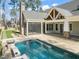 Resort style pool with outdoor kitchen and putting green at 291 Riverstone Dr, Pittsboro, NC 27312