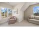 Cozy sitting area with comfy chair and views of the backyard at 291 Riverstone Dr, Pittsboro, NC 27312