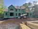 View of new construction home with wood and other construction materials present at 501 Hertford St, Raleigh, NC 27609