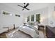 Bright bedroom with hardwood floors and large windows at 2601 Mayview Rd, Raleigh, NC 27607