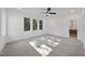 Bright and airy bedroom with grey carpet and large windows at 2601 Mayview Rd, Raleigh, NC 27607