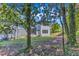 View of the home's backyard, landscaping, and modern architectural details at 2601 Mayview Rd, Raleigh, NC 27607