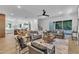 Open-concept living space with hardwood floors and a modern kitchen visible in background at 2601 Mayview Rd, Raleigh, NC 27607