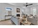 Comfortable living room featuring a cozy fireplace and neutral decor at 2601 Mayview Rd, Raleigh, NC 27607