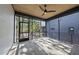 Relaxing screened porch with wood ceiling and stone tile floor at 2601 Mayview Rd, Raleigh, NC 27607