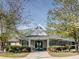 Exterior of the Chapel Ridge clubhouse with a well-maintained lawn and landscaping at 57 Hazelwood, Pittsboro, NC 27312