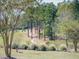 Scenic golf cart path winding through a lush, tree-lined landscape at 72 Hazelwood, Pittsboro, NC 27312