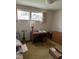 Bedroom with desk, chair, and ample window light at 3418 Leonard St, Raleigh, NC 27607