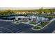 An aerial view showcases the community clubhouse with pool, tennis courts, and ample parking at 167 Edgefield St, Pittsboro, NC 27312
