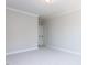 Bright bedroom featuring neutral paint, white trim, and plush carpeting at 167 Edgefield St, Pittsboro, NC 27312