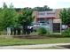 Commercial building with professional signage, mature trees, and easy access from the road at 167 Edgefield St, Pittsboro, NC 27312