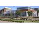 Exterior view of Mosaic Sales & Learning Center, retail shops and restaurants in the community at 167 Edgefield St, Pittsboro, NC 27312