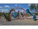 Modern playground with a variety of play structures for , surrounded by a wood chip safety surface at 167 Edgefield St, Pittsboro, NC 27312
