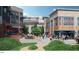 Outdoor plaza with restaurants, shaded seating, and pedestrian walkways in a lively neighborhood at 167 Edgefield St, Pittsboro, NC 27312