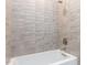 Bathroom with neutral tile and a bathtub at 75 Ridgeline Ct, Pittsboro, NC 27312