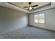 Bright bedroom with wood-look floors and ceiling fan at 345 Maidenhair Pl, Clayton, NC 27520