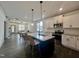 Open concept kitchen and living area with a large island at 345 Maidenhair Pl, Clayton, NC 27520