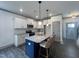 Modern kitchen with stainless steel appliances and an island at 345 Maidenhair Pl, Clayton, NC 27520