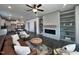 Open living room with fireplace and built-in shelving at 345 Maidenhair Pl, Clayton, NC 27520