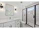 Stylish bathroom showcasing a sleek vanity, modern fixtures, and a glass-enclosed shower at 5307 Dixon Dr, Raleigh, NC 27609